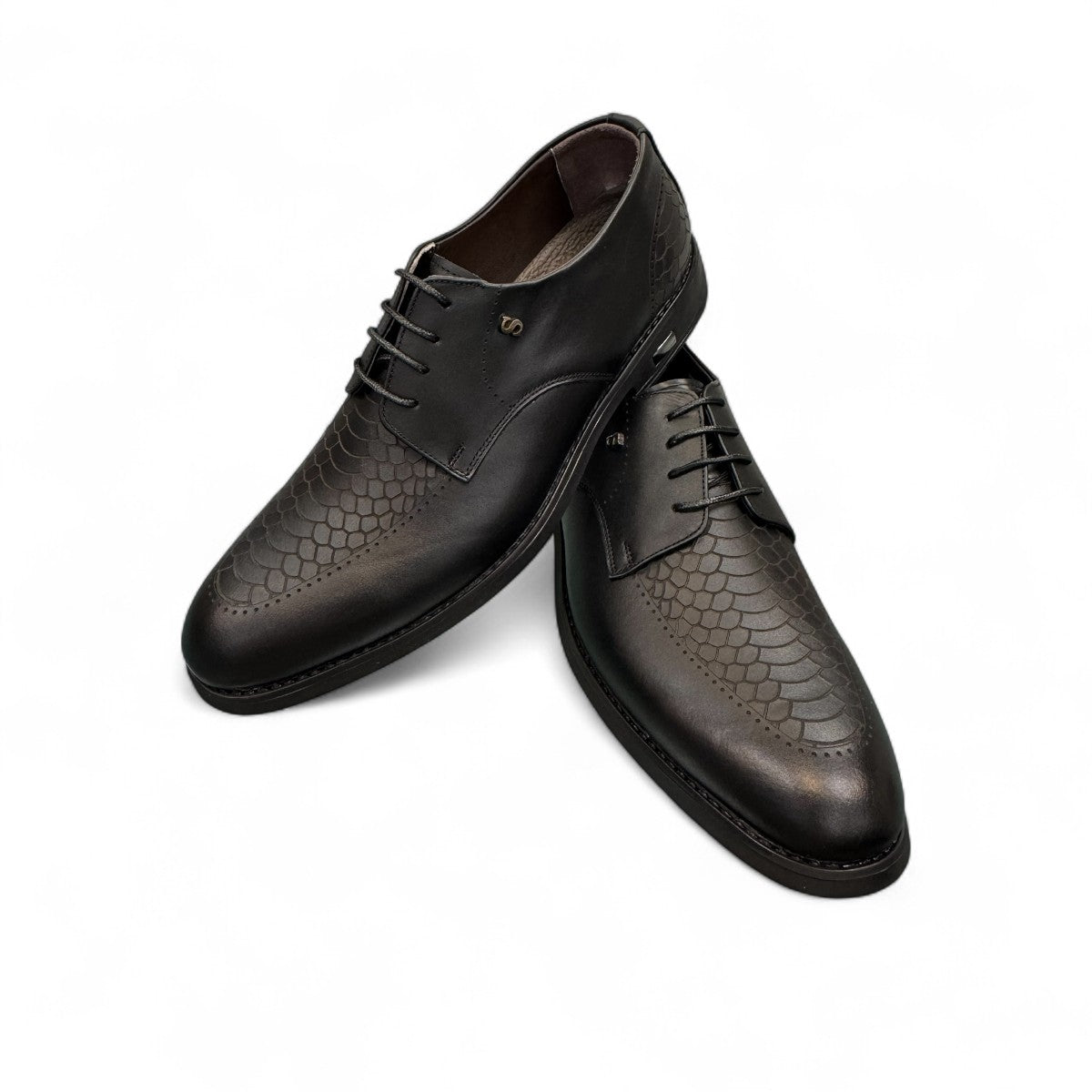 Sun Radmehr black leather lace-up dress shoe with textured heel and side detail. Photo of upper view 1.