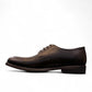 Sun Radmehr black leather lace-up dress shoe with textured heel and side detail. Photo of right side view.