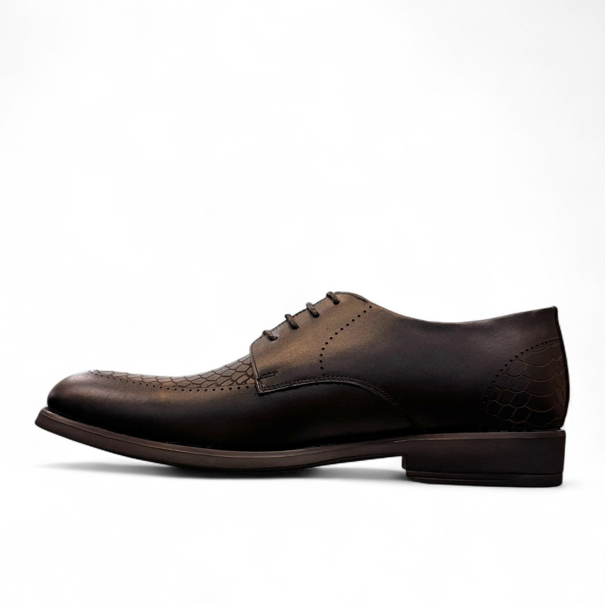 Sun Radmehr black leather lace-up dress shoe with textured heel and side detail. Photo of right side view.