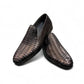 Sun Roniya black leather loafers featuring intricate handmade woven detailing and a rubber outsole. Photo of front view 1.