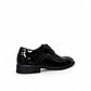 Sun Vali black patent leather lace-up dress shoe with refined stitching and durable rubber outsole. Photo of back view from a side angle.