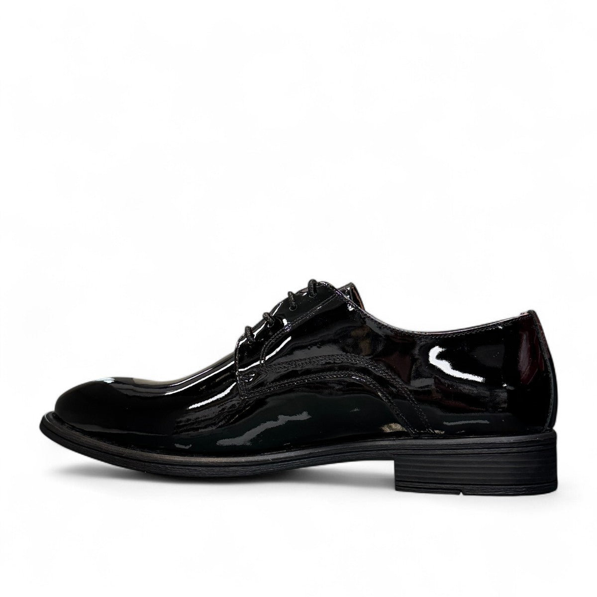 Sun Vali black patent leather lace-up dress shoe with refined stitching and durable rubber outsole. Photo of inside side view.