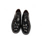 Sun Vali black patent leather lace-up dress shoe with refined stitching and durable rubber outsole. Photo of upper view.