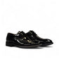 Sun Vali black patent leather lace-up dress shoe with refined stitching and durable rubber outsole. Photo of front view 1.