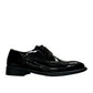 Sun Vali black patent leather lace-up dress shoe with refined stitching and durable rubber outsole. Photo of outside side view.