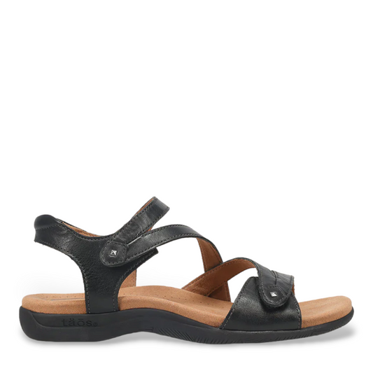 Taos Big Time black leather walking sandals with adjustable hook and loop straps and arch support. Photo of outside side view.