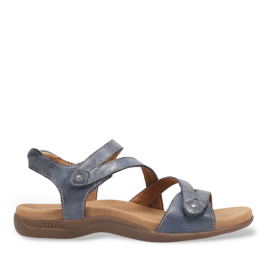 Taos Big Time dark blue leather walking sandals with adjustable straps and cushioned arch support. Photo of outside side view.