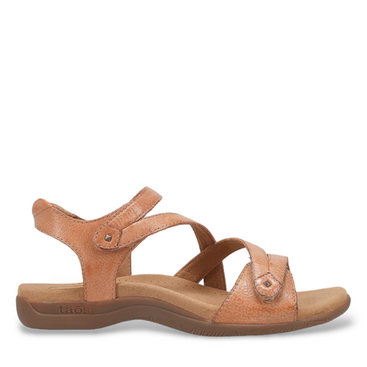 Taos Big Time natural leather sandals with adjustable straps, arch support, and a cushioned footbed. Photo of outside side view.