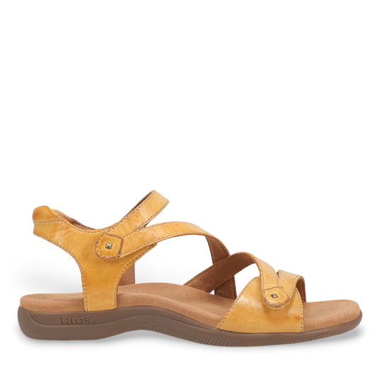 Taos Big Time yellow leather walking sandals with adjustable straps and supportive arch footbed. Photo of outside side view.
