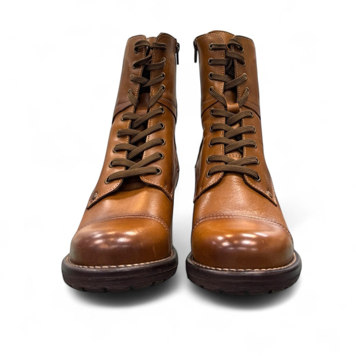 Taos Crave classic camel leather lace-up boot with side buckle and block heel. Photo of front view.