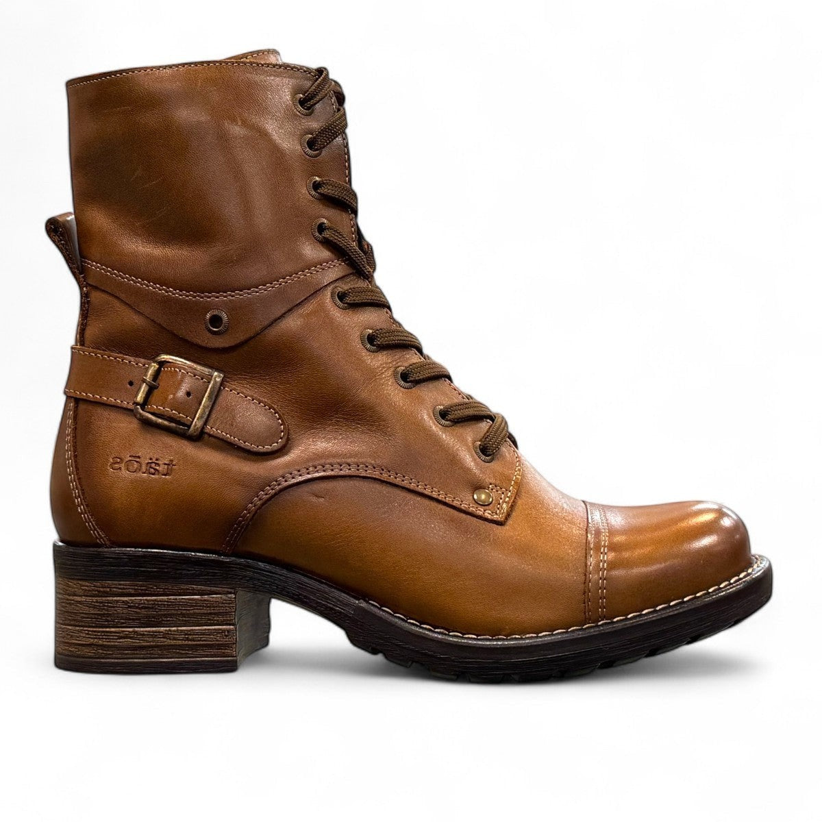 Taos Crave classic camel leather lace-up boot with side buckle and block heel. Photo of inside side view.