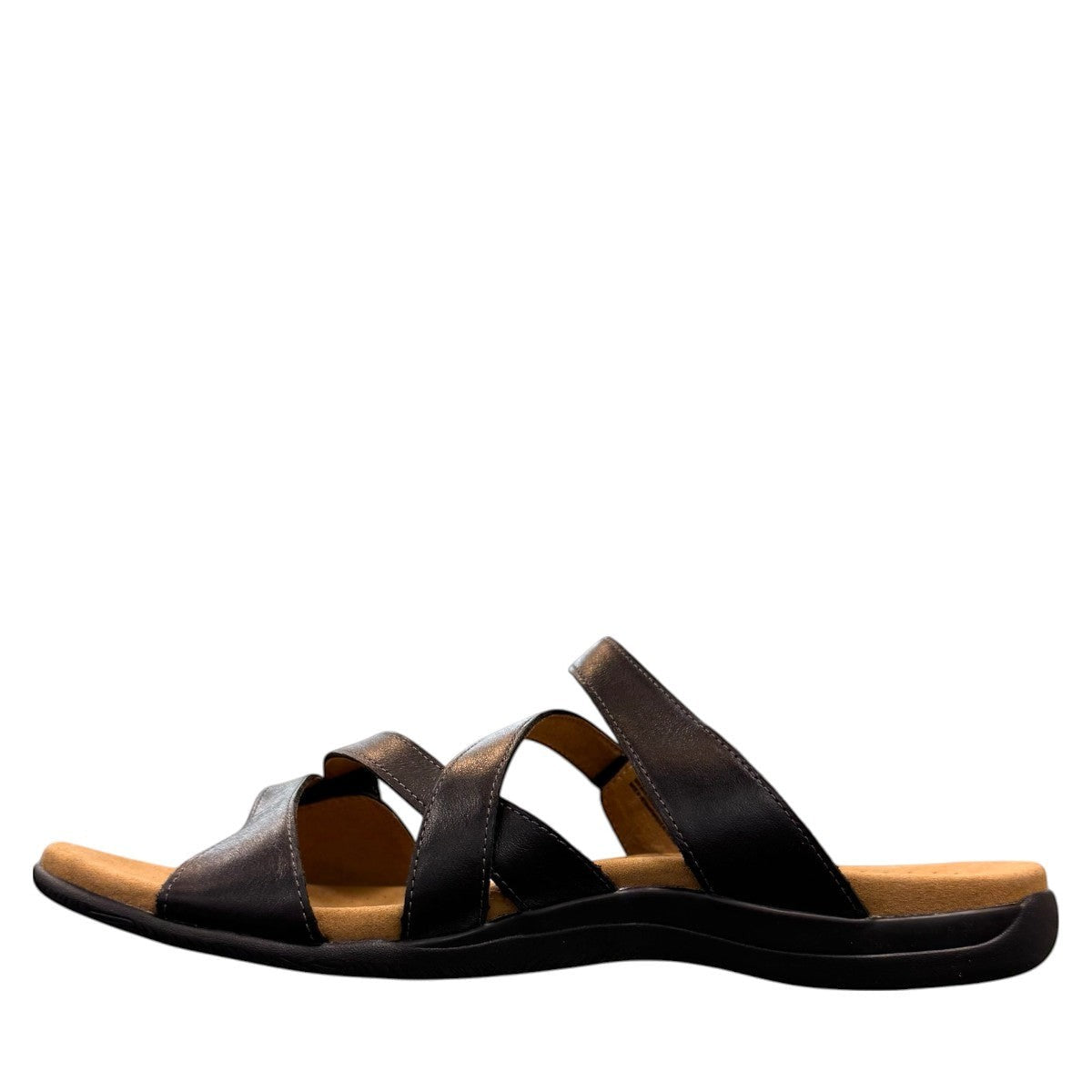 Taos Double U black leather slide sandal with adjustable hook and loop straps and cushioned foot bed. Photo of inside side view.