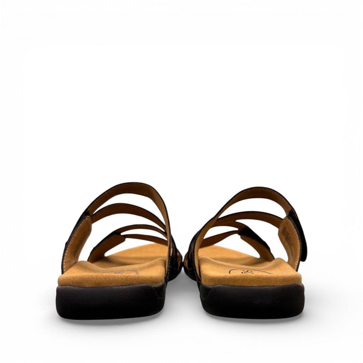 Taos Double U black leather slide sandal with adjustable hook and loop straps and cushioned foot bed. Photo of back view.