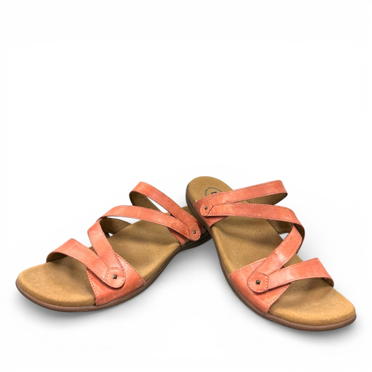 Taos Double U leather slide sandals in bruschetta red with adjustable hook and loop straps. Photo of front view.