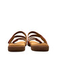 Taos Double U leather slide sandals in bruschetta red with adjustable hook and loop straps. Photo of back view.