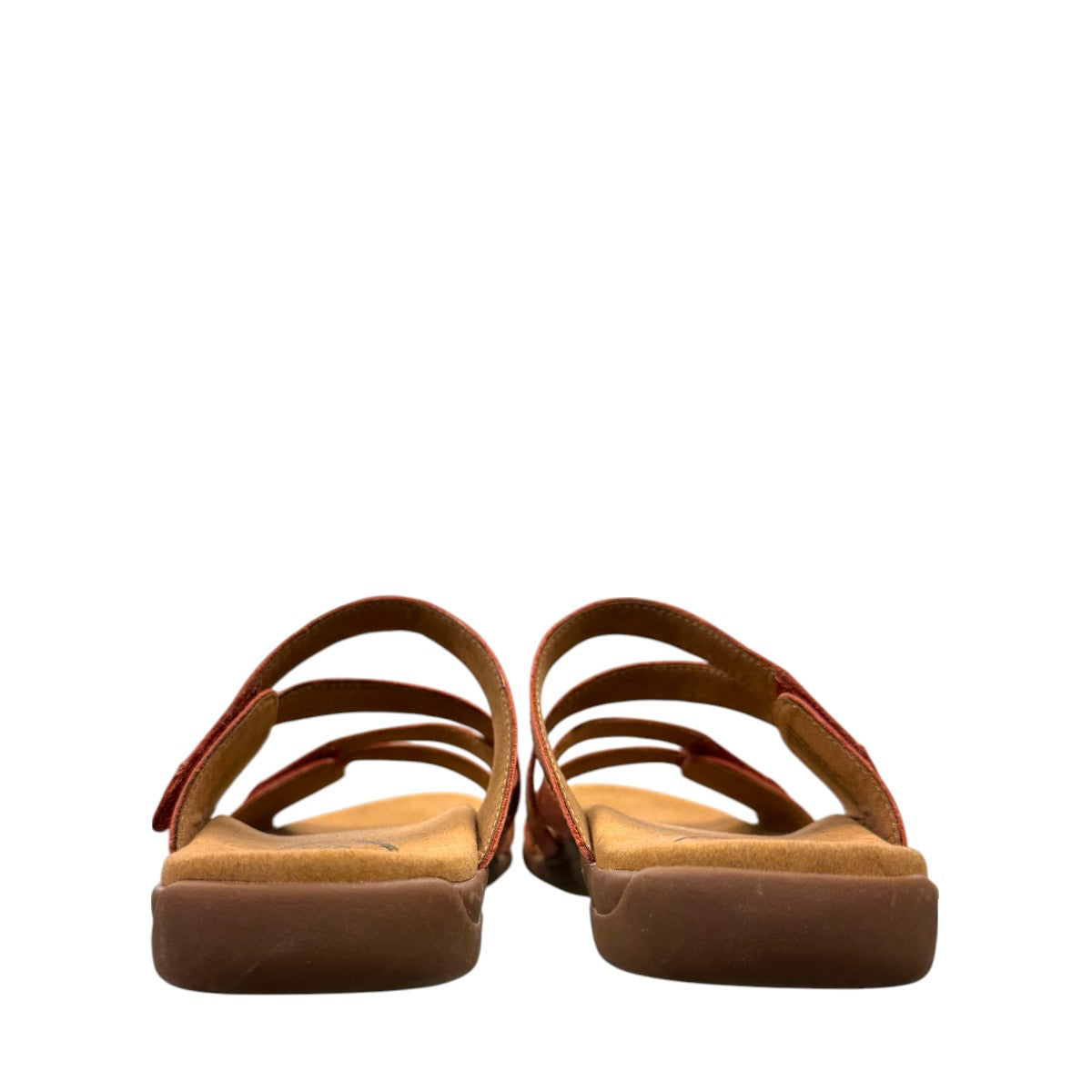 Taos Double U leather slide sandals in bruschetta red with adjustable hook and loop straps. Photo of back view.