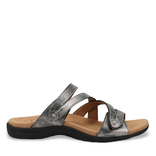Taos Double U pewter leather slide sandal with adjustable hook and loop straps and cushioned footbed. Photo of outside side view.