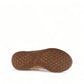 Taos Future Mid chestnut suede ankle boot with faux fur lining and flexible honeycomb rubber outsole. Photo of bottom view.