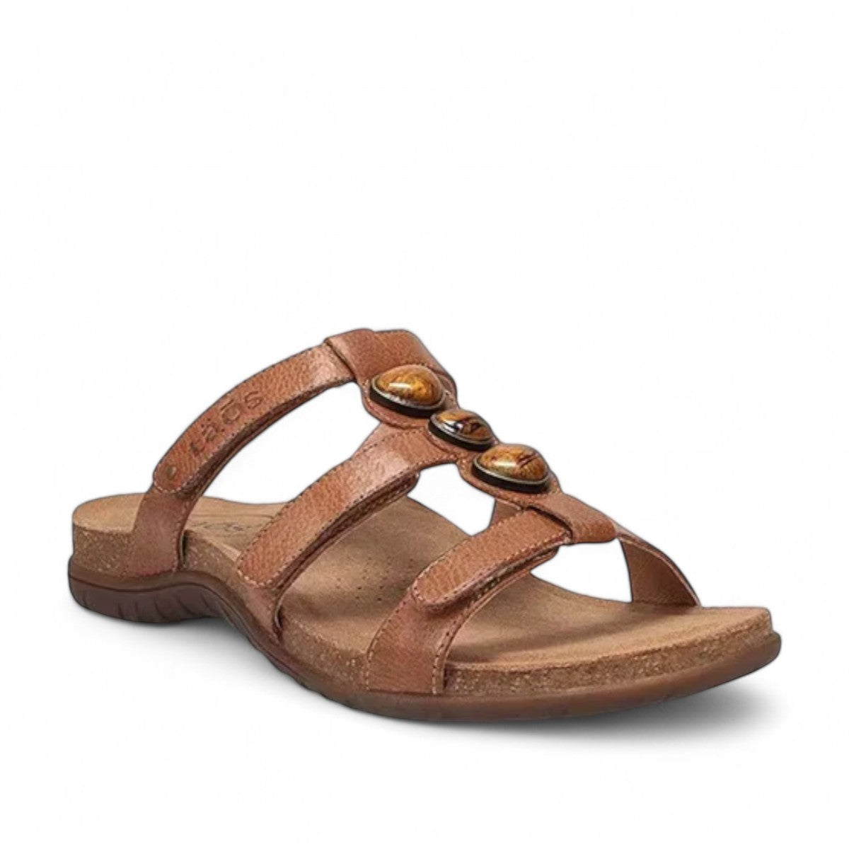 Taos Gemma hazelnut leather slide sandal with decorative stone accents and adjustable velcro straps. Photo of front view.