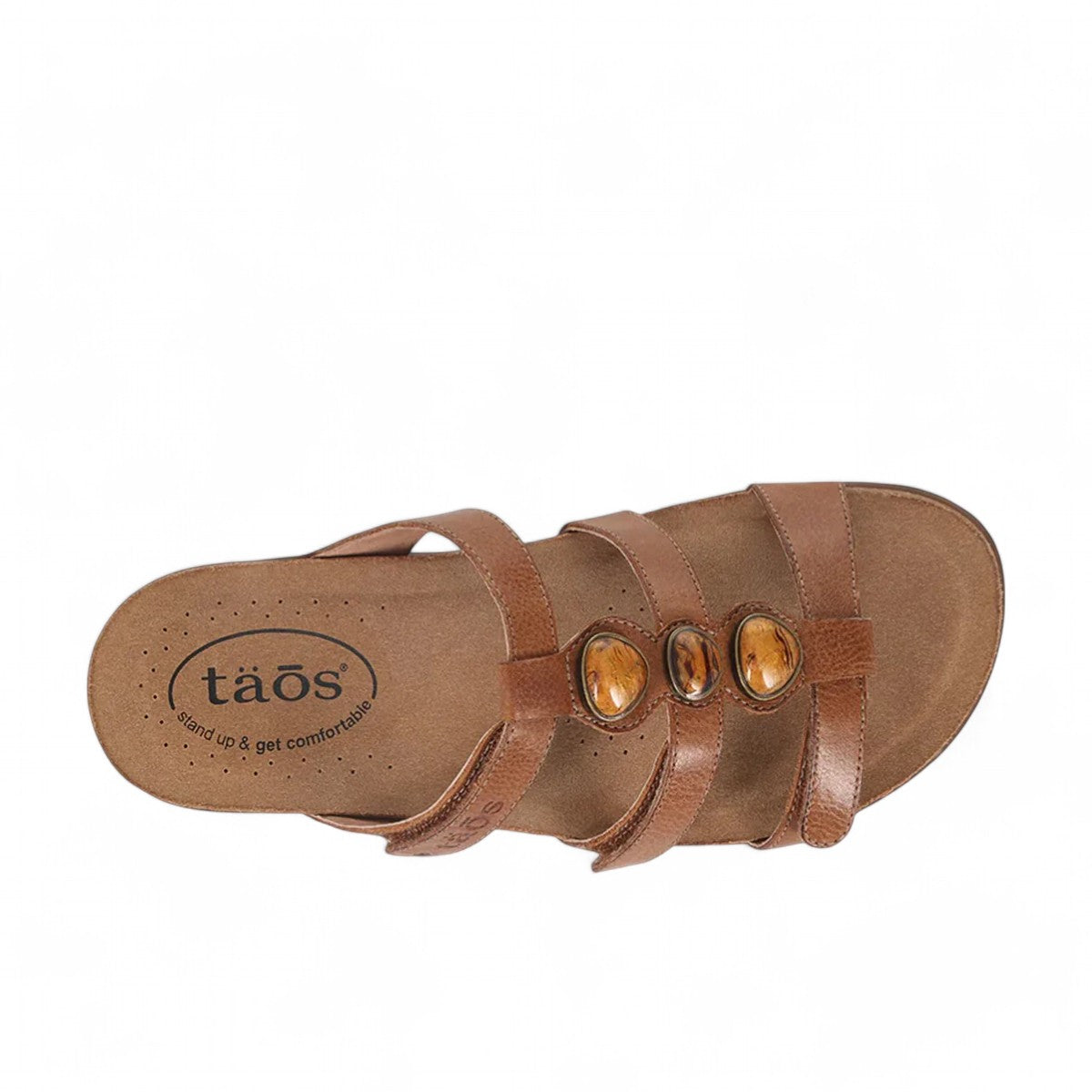 Taos Gemma hazelnut leather slide sandal with decorative stone accents and adjustable velcro straps. Photo of upper view.
