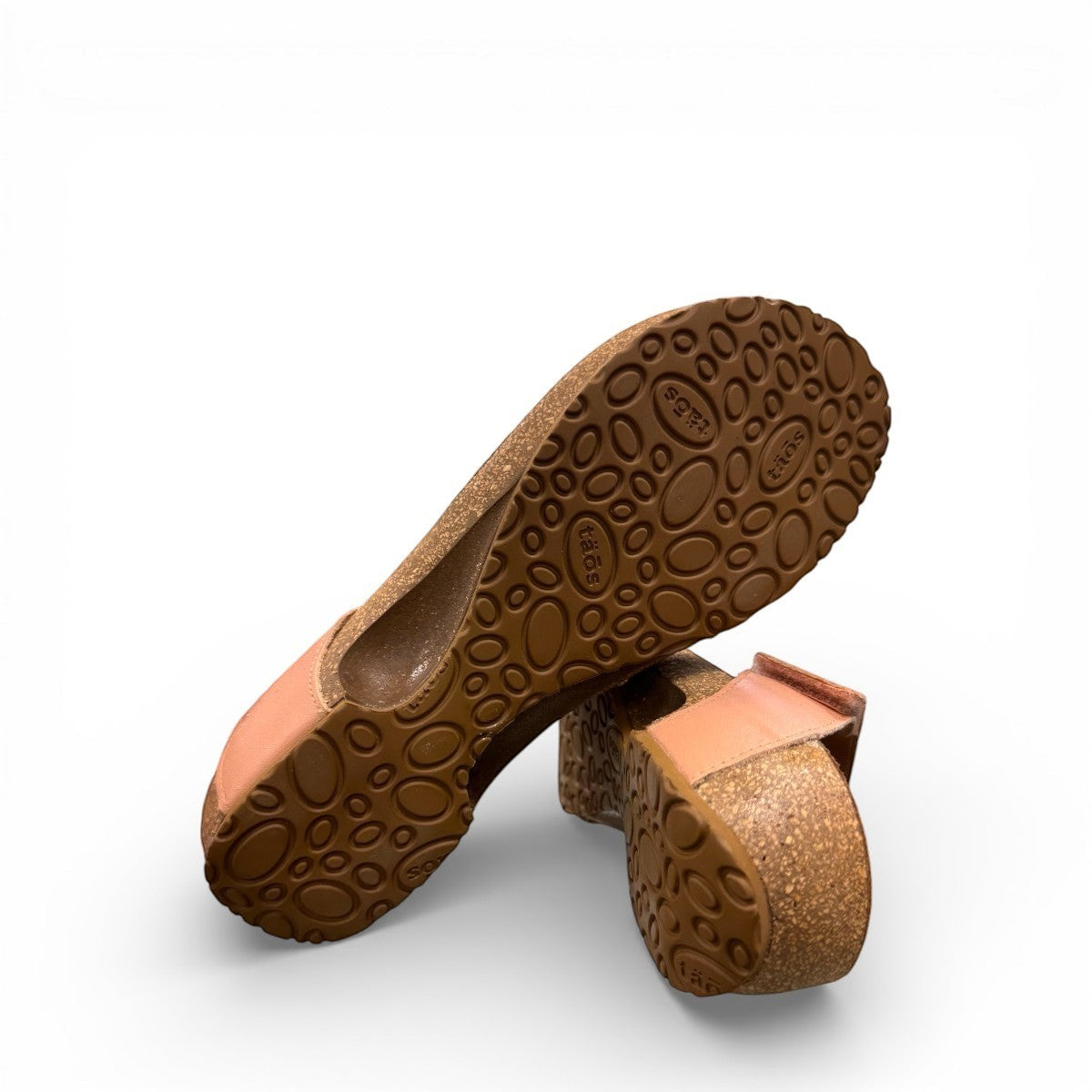 Taos Loop blush leather wedge sandal with adjustable hook-and-loop strap and cork foot bed. Photo of bottom view.
