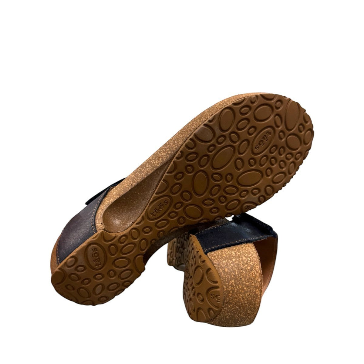 Taos Loop navy leather toe-post sandal with adjustable hook-and-loop strap and cushioned cork foot bed. Photo of bottom view.