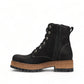 Taos Main Street black rugged leather lace-up platform boot with cork midsole and rubber lug outsole. Photo of right side view.