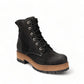 Taos Main Street black rugged leather lace-up platform boot with cork midsole and rubber lug outsole. Photo of front view.