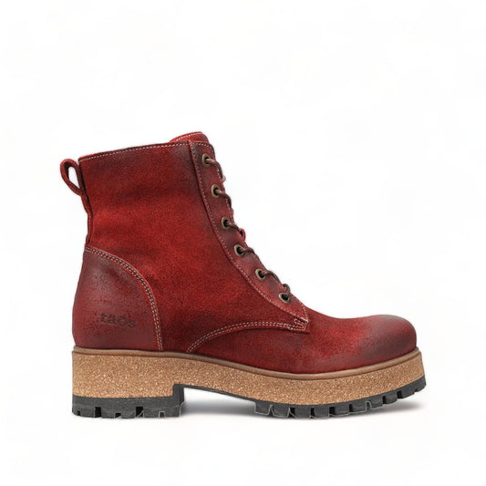 Taos Main Street garnet red leather lace-up platform boot with a cork midsole and rubber lug sole. Photo of outside side view.