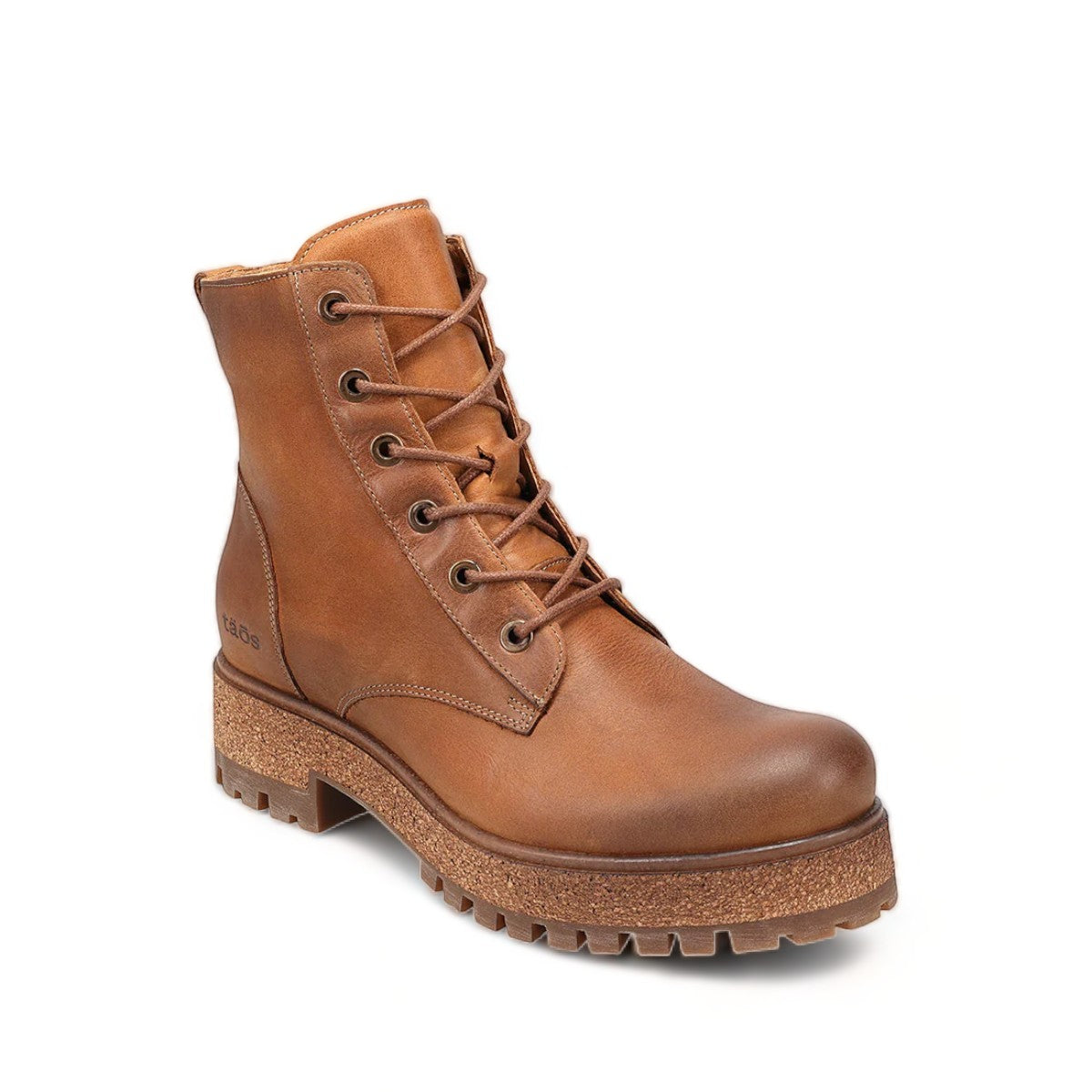 Taos Main Street tan leather lace-up platform boot with a cork midsole and rugged rubber lug outsole. Photo of front view.