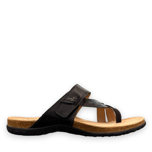 Taos Perfect black leather thong sandal with adjustable strap, cork-latex midsole, and rubber outsole. Photo of inside side view.