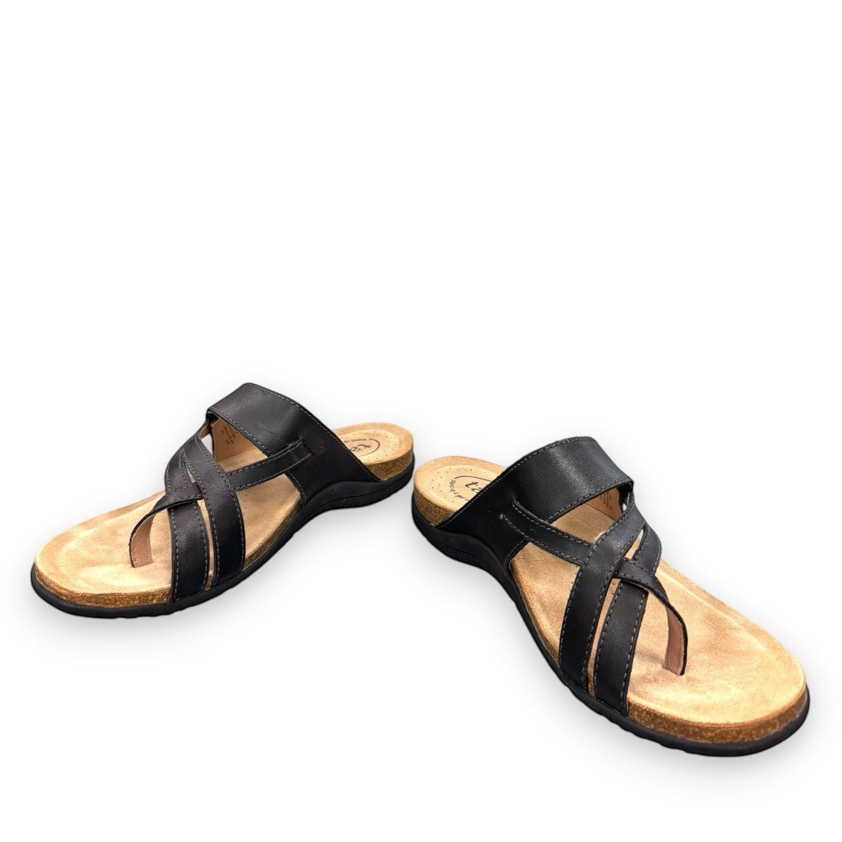 Taos Perfect black leather thong sandal with adjustable strap, cork-latex midsole, and rubber outsole. Photo of front view.