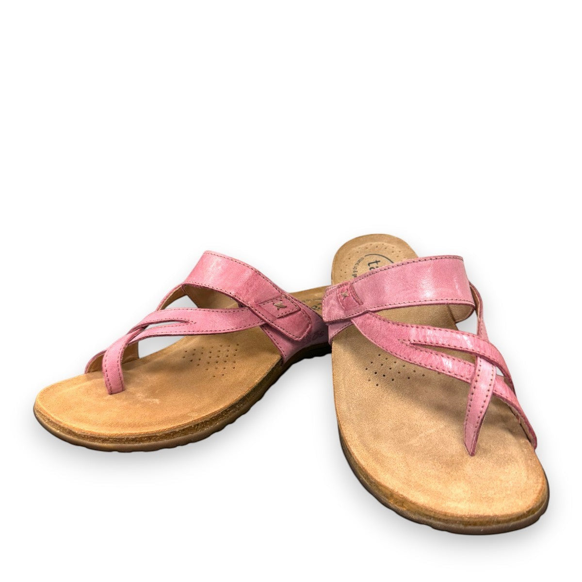 Taos Perfect thong sandal in rustic pink leather with adjustable hook-and-loop strap and cork midsole. Photo of front view.