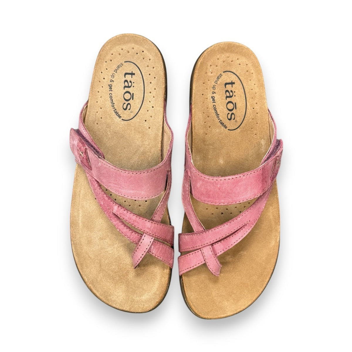 Taos Perfect thong sandal in rustic pink leather with adjustable hook-and-loop strap and cork midsole. Photo of upper view.