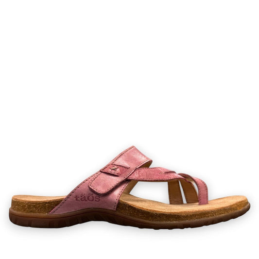 Taos Perfect thong sandal in rustic pink leather with adjustable hook-and-loop strap and cork midsole. Photo of outside side view.
