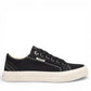 Taos Plim Soul black canvas sneaker with white rubber platform sole and decorative stitching. Photo of outside side view.