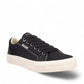 Taos Plim Soul black canvas sneaker with white rubber platform sole and decorative stitching. Photo of front view.