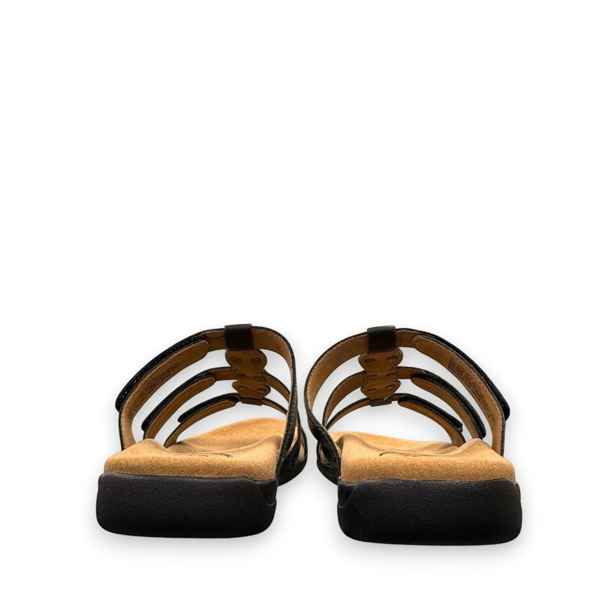 Taos Prize 4 black leather slide sandals with adjustable hook and loop straps and cushioned foot bed. Photo of back view.