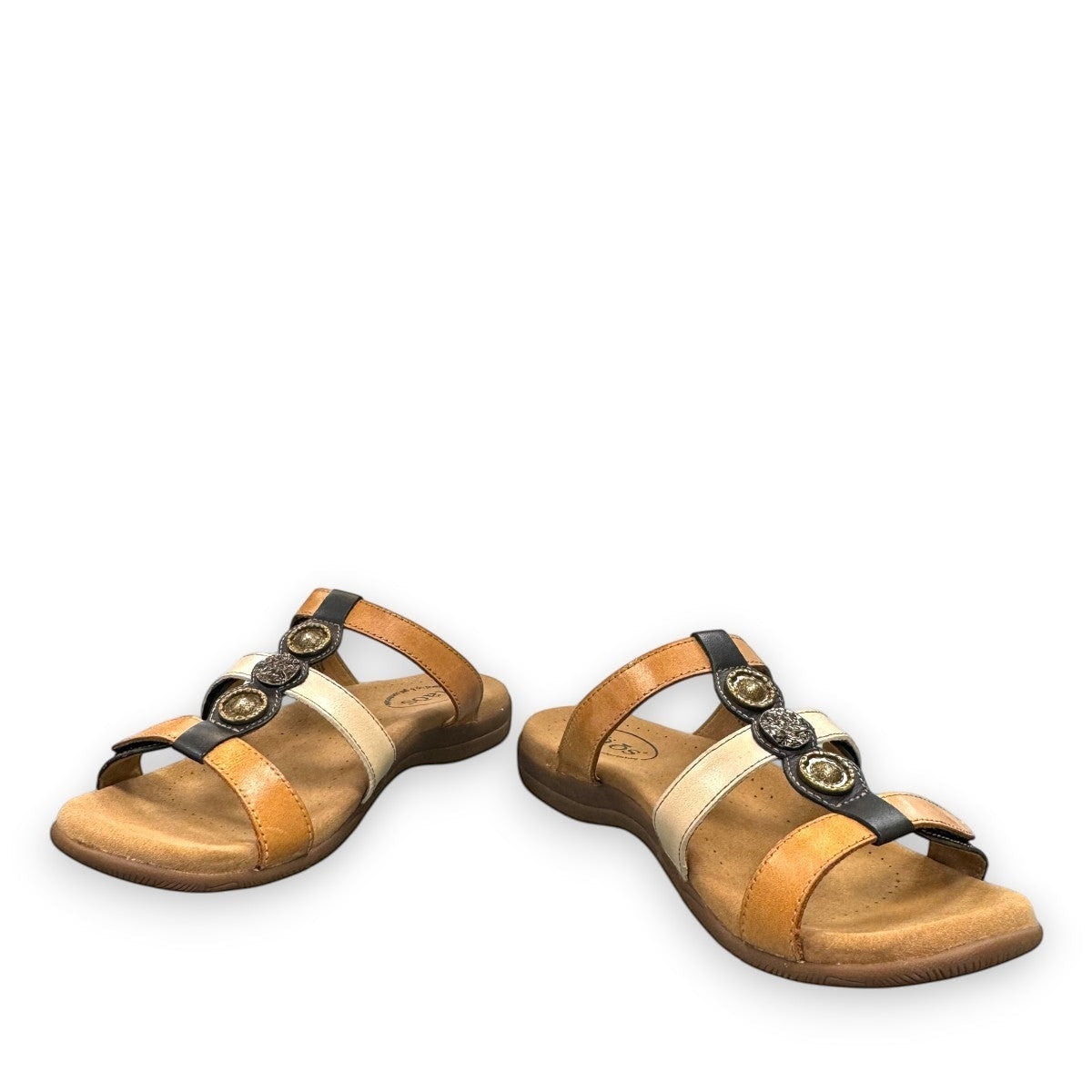 Taos Prize 4 tan multi leather slide sandals with adjustable hook and loop straps and medallion hardware. Photo of front view 2.