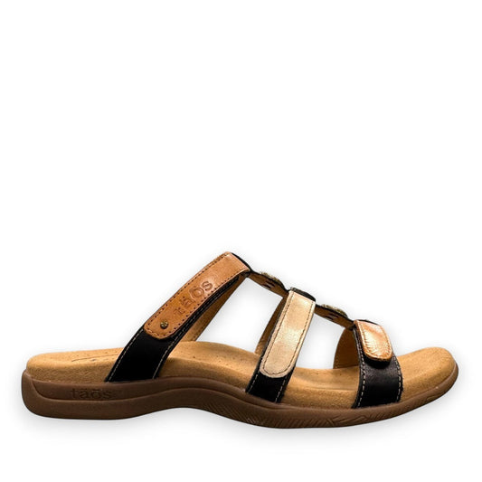 Taos Prize 4 tan multi leather slide sandals with adjustable hook and loop straps and medallion hardware. Photo of outside side view.