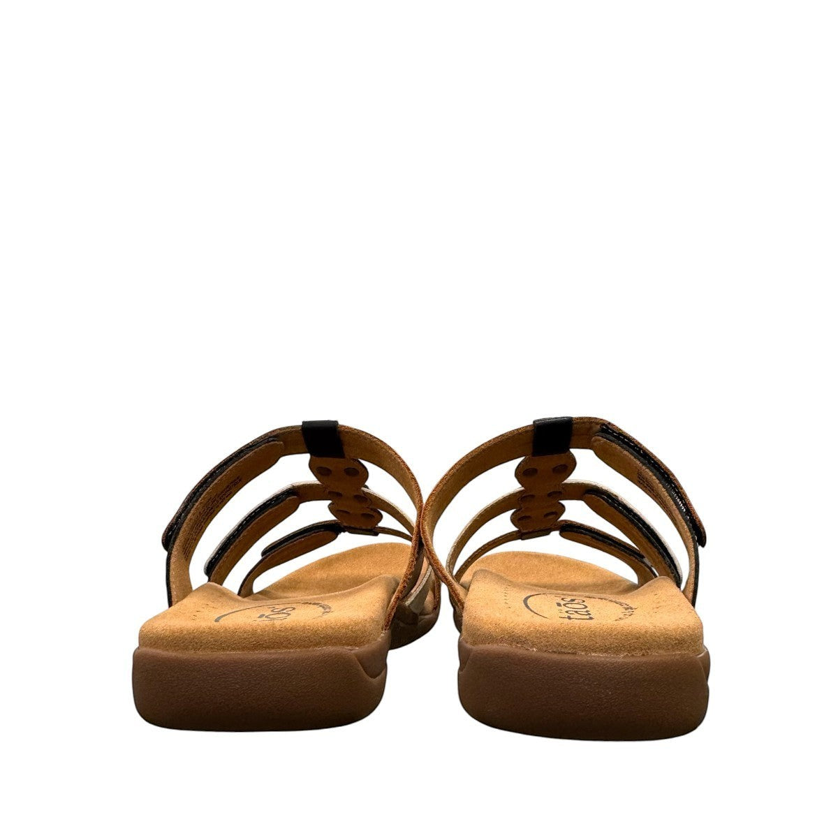 Taos Prize 4 tan multi leather slide sandals with adjustable hook and loop straps and medallion hardware. Photo of back view.
