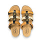Taos Prize 4 tan multi leather slide sandals with adjustable hook and loop straps and medallion hardware. Photo of upper view.