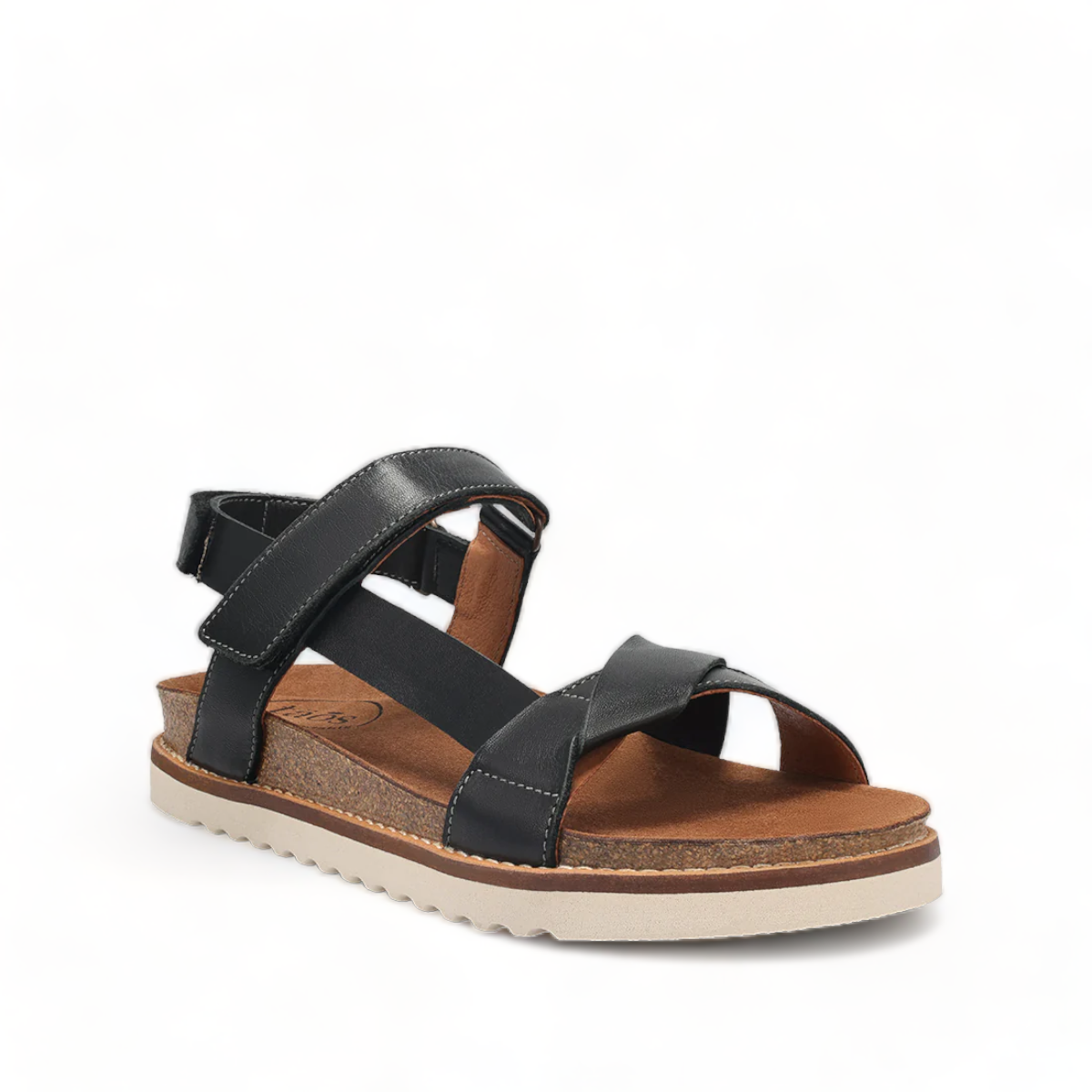 Taos Sideways black leather adjustable sandal with cork midsole and off-white EVA outsole. Photo of front view.