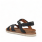 Taos Sideways black leather adjustable sandal with cork midsole and off-white EVA outsole. Photo of back view.