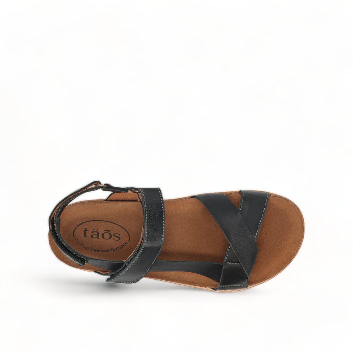 Taos Sideways black leather adjustable sandal with cork midsole and off-white EVA outsole. Photo of upper view.