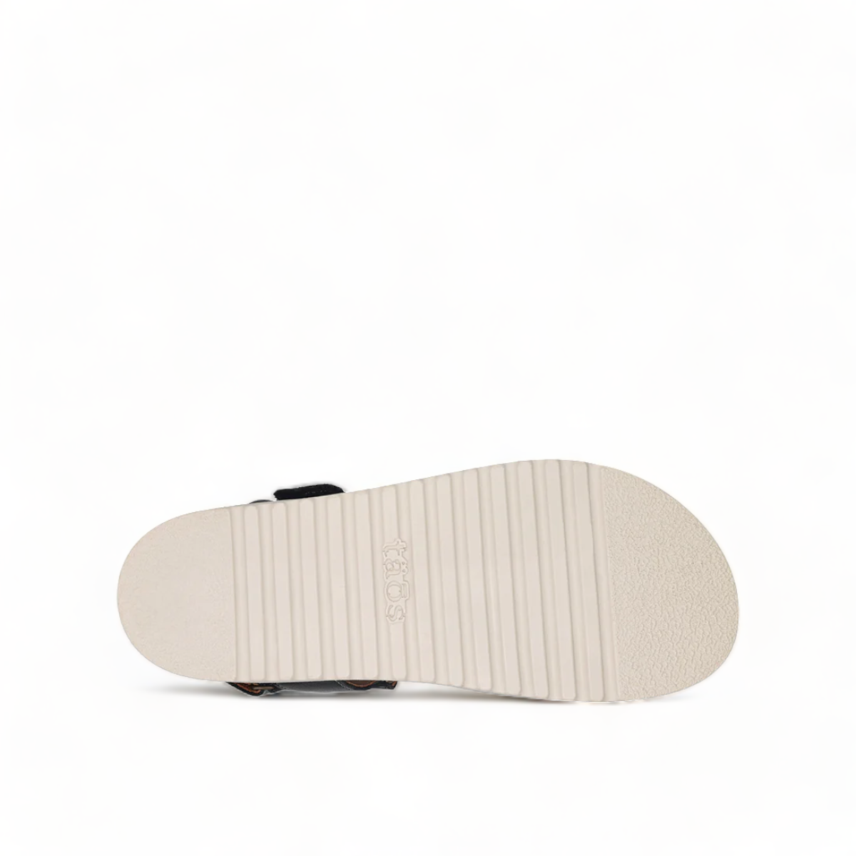 Taos Sideways black leather adjustable sandal with cork midsole and off-white EVA outsole. Photo of bottom view.