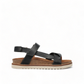 Taos Sideways black leather adjustable sandal with cork midsole and off-white EVA outsole. Photo of right side view.