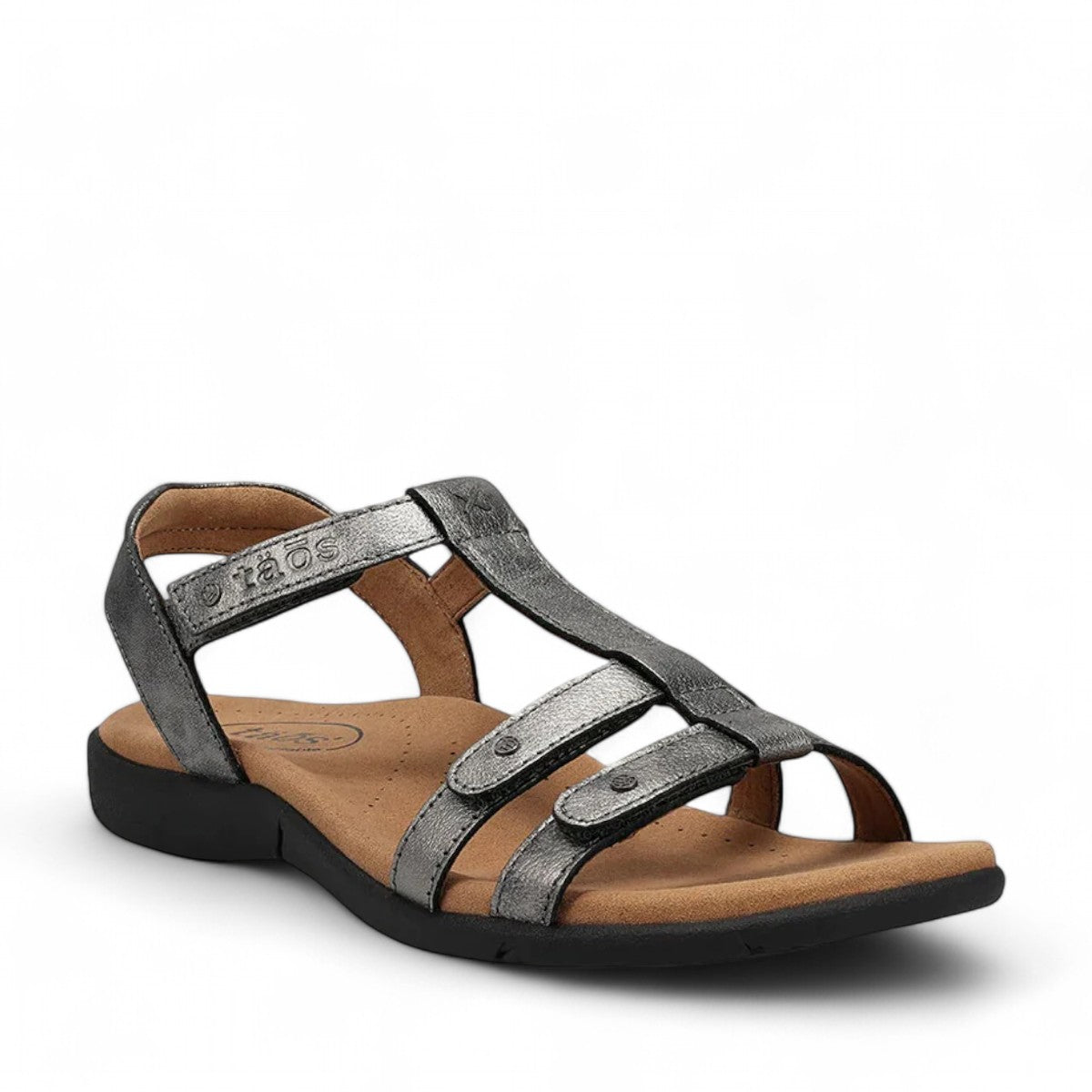 Taos Trophy 2 pewter leather strappy sandal with adjustable hook and loop straps and cushioned foot bed. Photo of front view.