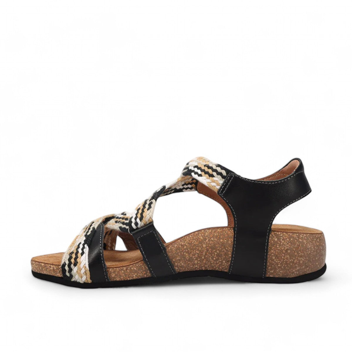 Taos Trulie L.E. black multi woven adjustable sandal with cork foot bed and arch support. Photo of inside side view.