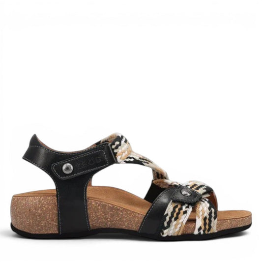 Taos Trulie L.E. black multi woven adjustable sandal with cork foot bed and arch support. Photo outside side view.
